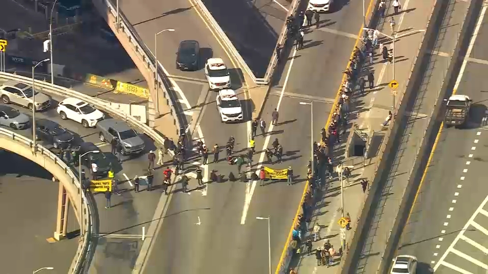 Protesters blocking traffic on Brooklyn Bridge
       — WABC-TV Eyewitness News (ABC7 NY)