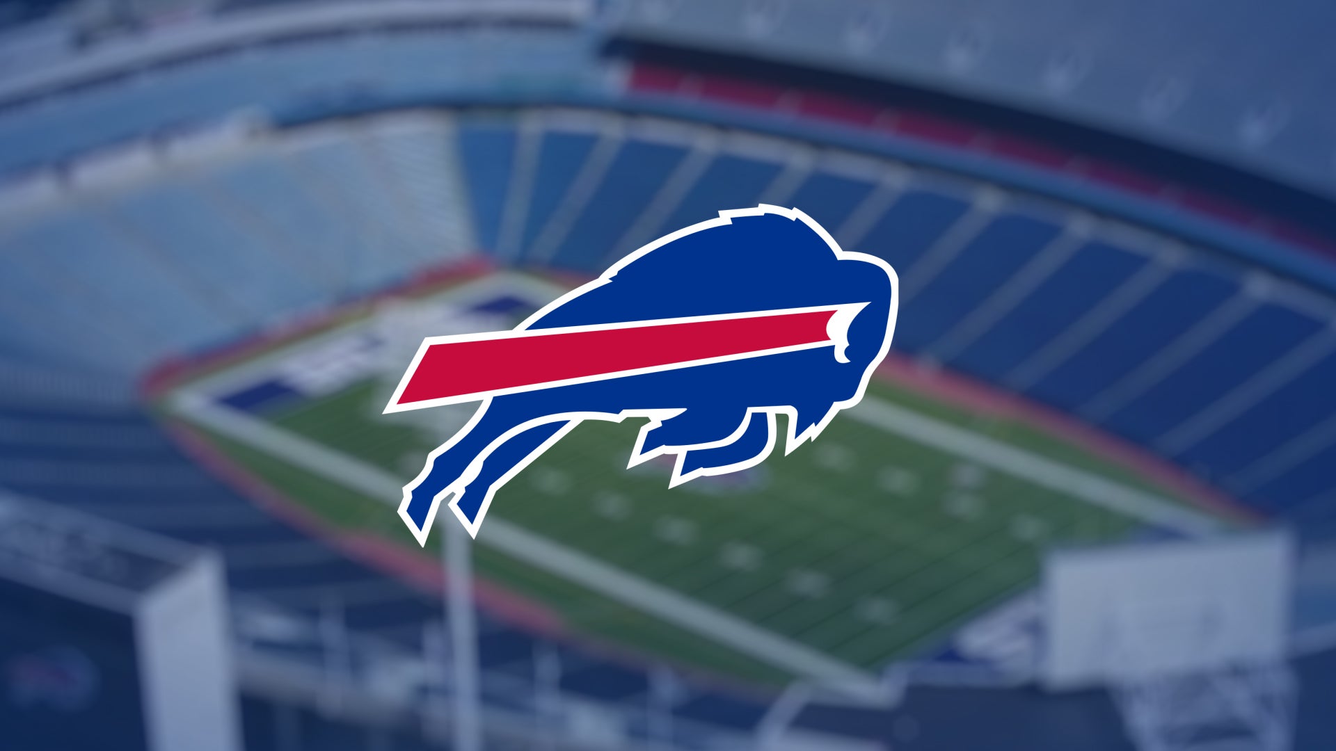Buffalo Bills fans cheering loudly at Highmark Stadium, a vibrant sea of blue and red jerseys under stadium lights